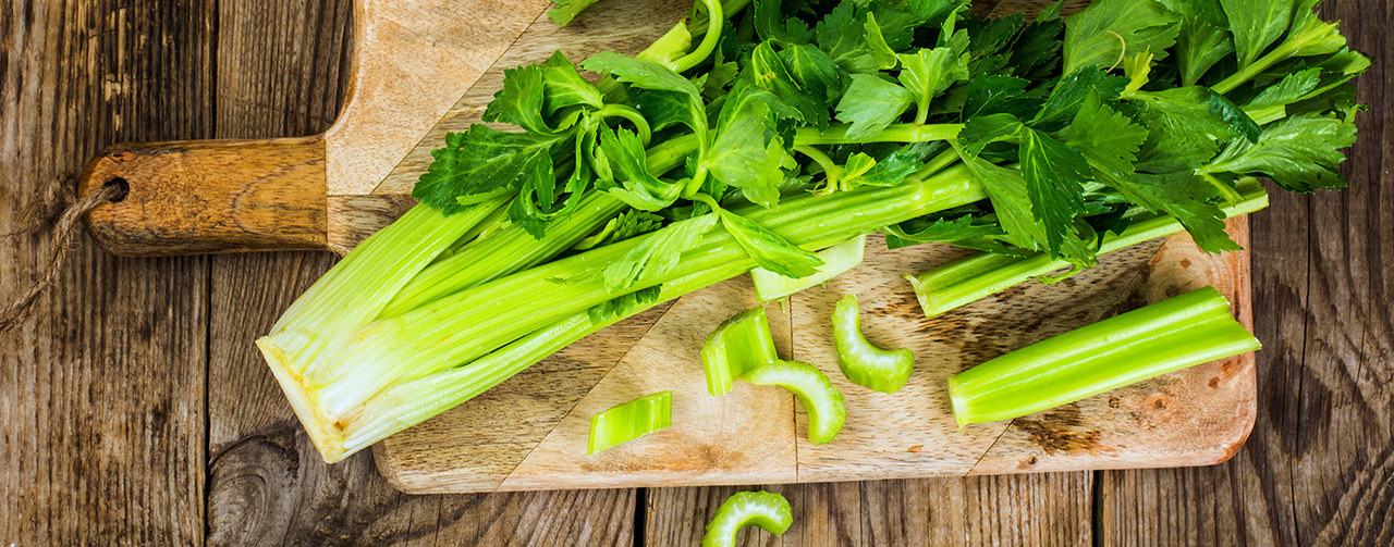 Bunch of fresh celery stalk with leaves