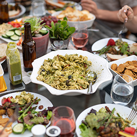 People sharing outdoor meals