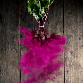 explosion of red beet turning into powder