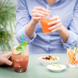 Friends sharing a friendly time with beverages