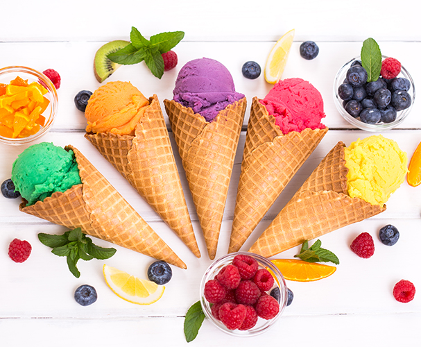 Top view of natural colorful frozen cones with berries