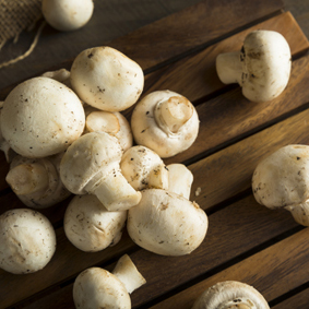 Top view of fresh mushrooms ingredients on wooden table