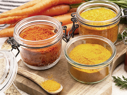 Assortement of orange carrot ingredients on table