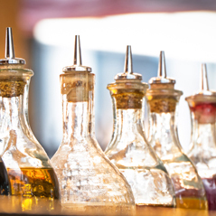 Close up of vinegars bottles