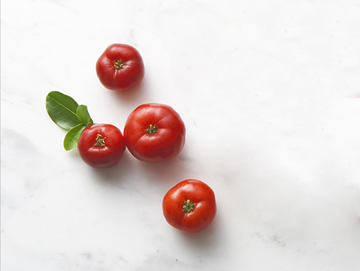 Top view of acerola on marble table