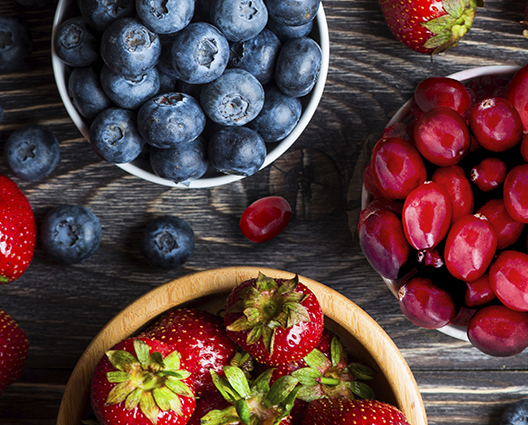 Top view of berries on wooden table