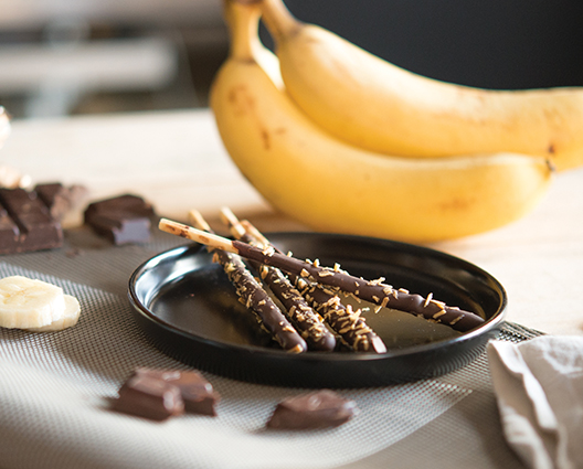 Mikado chocolate with crunchies of banana