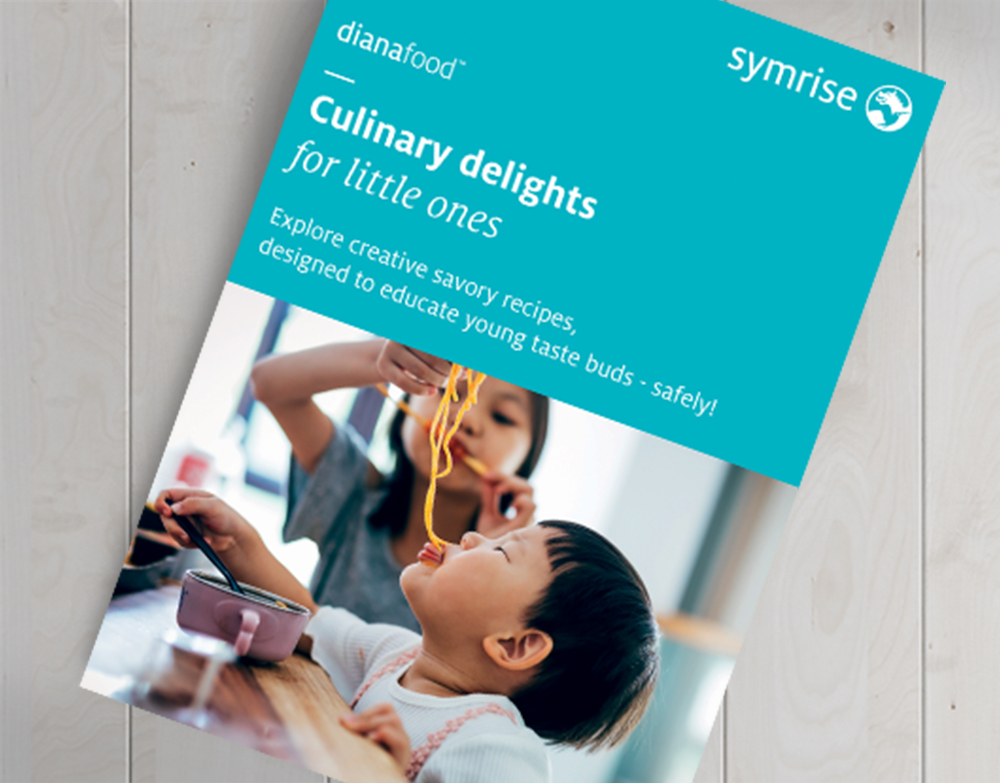 Top view of the Culinary Delights Little Ones Booklet on wooden table